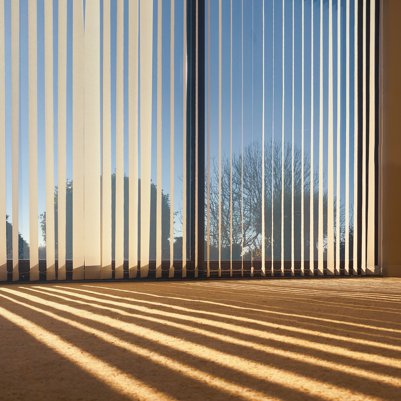 Vertical Blinds on large open window