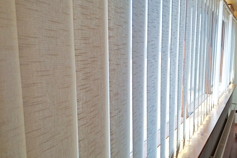 Vertical blinds in commercial office space 